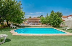 Nice home in La Carlota with Outdoor swimming pool, WiFi and 4 Bedrooms